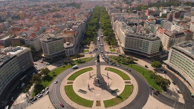LISBON, PORTUGAL - JANUARY 22, 2025: Aerial view of Marques de Pombal Square showcasing busy urban life and vibrant landscape