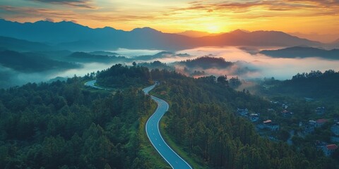 Winding mountain road with a breathtaking sunrise view
