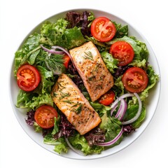 A zesty lemon dill salmon salad with mixed greens, cherry tomatoes, and thinly sliced red onions