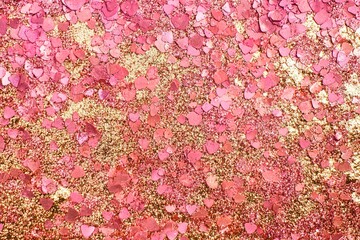 Pink and gold glitter hearts background