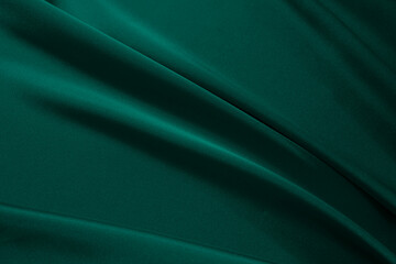 Black dark deep emerald green abstract background. Silk satin velvet fabric. Elegant luxury rich. Curtain drapery fold line wave flowing. Birthday, Christmas. Design.