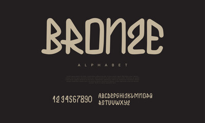 Fototapeta premium Bronze font Calligraphy Logotype Script Brush Font Type Font lettering handwritten