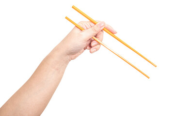 Female hand holding a orange plastic chopstick isolated on white background.