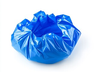 Crumpled blue plastic trash bag isolated on white.