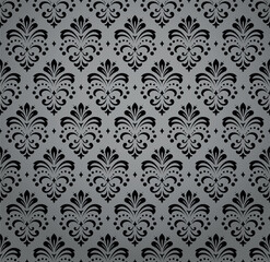 Wallpaper in the style of Baroque. Seamless vector background. Gray and black floral ornament. Graphic pattern for fabric, wallpaper, packaging. Ornate Damask flower ornament
