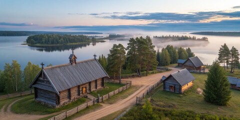 Fototapeta premium Scenic view of a rustic church and lake at dawn in a tranquil countryside setting