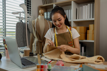 a beautiful female tailor is consulting and talking with a customer to make an agreement that the proposed clothing style matches the customer's requirements, designer, entrepreneur, sewing