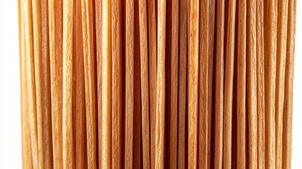 Obraz premium Numerous Wooden Skewers Arranged Vertically Close Up Detail in Brownish Tones.