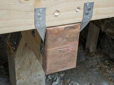 Joist Hanger with Copper Flashing in Deck Construction