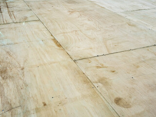 Wooden Plywood Subfloor Installation in Construction