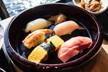 Assorted Nigiri Sushi in a Black Lacquered Bowl