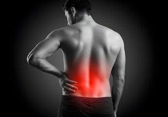 Fototapeta premium Man Experiencing Severe Lower Back Pain, Medical Illustration Showing Red Highlight on Affected Area