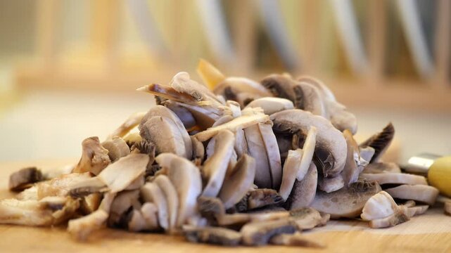 Chopped mushrooms on a wooden board