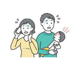 急な発熱をした子供を抱いて焦る若い父親と医療機関に電話する母親
