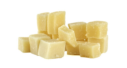 Parmesan cheese cubes forming a delicious pile on white background