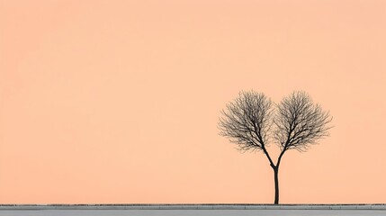 Solitary Tree Against Calming Pastel Background at Sunset