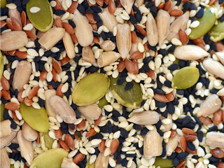 Healthy seed mix of flax seeds, pumpkin seeds, sunflower seeds, and black and white sesame seeds