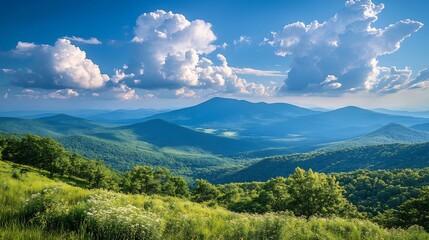 Obraz premium Serene mountain vista bathed in warm sunlight vibrant green hills rolling towards blue hazy peaks. AI Generated
