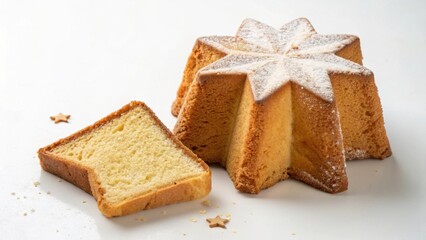 A delectable star-shaped cake, dusted with powdered sugar, and a perfectly sliced piece, ready to be enjoyed.
