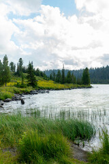 Mountain landscape. Beautiful shores of a mountain lake.  Lake Oyskoye, Ergaki Nature Park