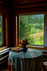 View from the window of the summer house to the mountain landscape