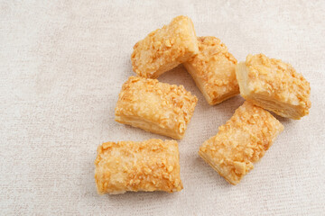 Crunchy pastry cookies with almond sprinkles 
