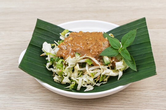 Karedok, raw vegetable salad with peanut sauce dressing, Sundanese signature dish. Indonesian food
