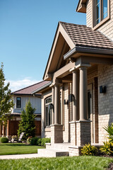 Fototapeta premium Luxury House Exterior: Modern Brick Home with Columns and Porch. Beautiful Residential Architecture and Landscaping.