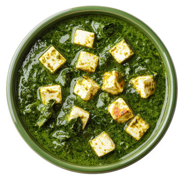 A green bowl of saag paneer with creamy spinach and chunks of paneer cheese. isolated on transparency background