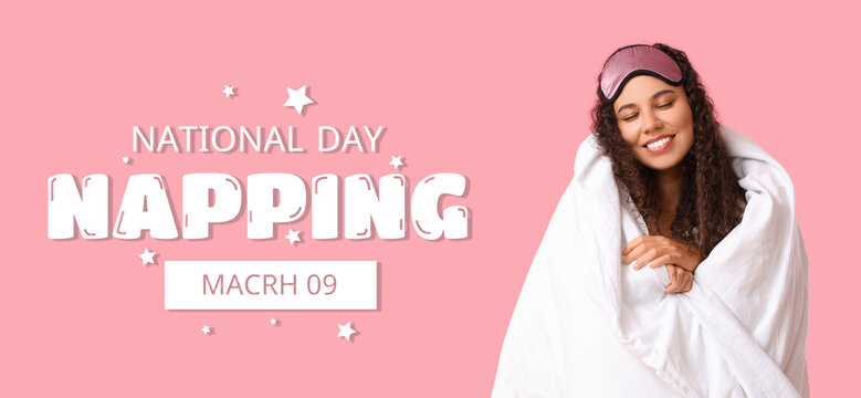 Beautiful young happy African-American woman with blanket on pink background