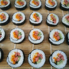 Delicious Sushi Roll with Sausage, Cucumber, and Carrot