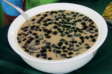 Black grass jelly ice served in a serving bowl