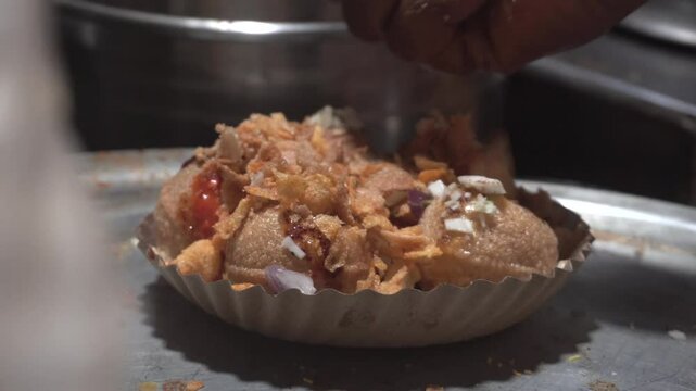 sev puri indian street food making closeup view