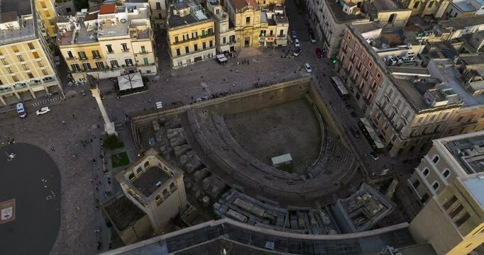 Colonna di Sant'Oronzo, Piazza Sant'Oronzo And Roman Amphitheater In Lecce, Italy. - aerial shot