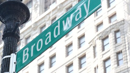 Broadway street road sign, Manhattan midtown district architecture, New York City corner. Traffic signage. Flatiron Building near Madison Square Park. Crossroad of 23 street, Bway and 5 Fifth avenue.