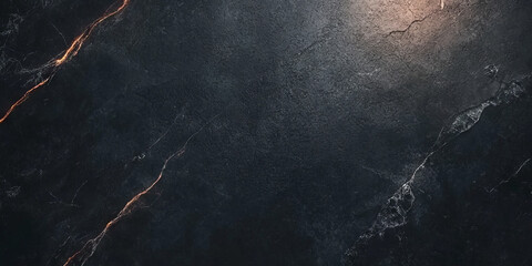 A deep charcoal black texture with soft highlights and subtle grain patterns