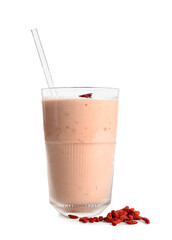Glass of fresh goji berry smoothie on white background