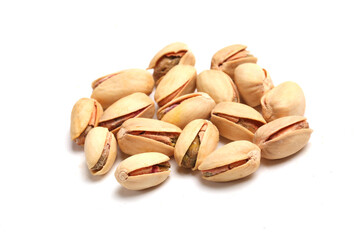 fresh pistachios on white background