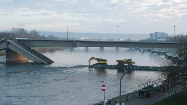 Repair work begins next to the collapsed Carola Bridge over the Elbe in Dresden
