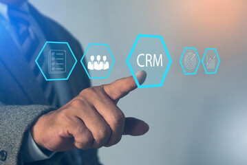 CRM Customer Relationship Management concept. Businessman pressing button on screen, analyzes business sales marketing system Customer Service Employment and Leadership Business