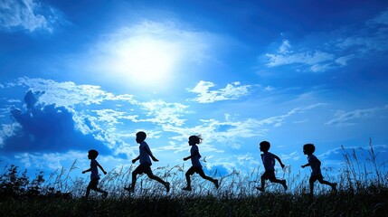 Children run joyfully across field, sunny sky.  Use  Childhood, freedom, happiness