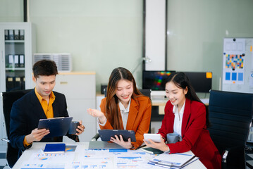 Young business creative team are brainstorming planning discussing while sitting in creative business discussing work