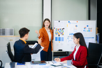 Young business creative team are brainstorming planning discussing while sitting in creative business discussing work