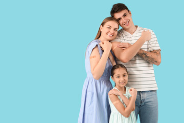Fototapeta premium Family with medical patches after vaccination showing muscles on blue background