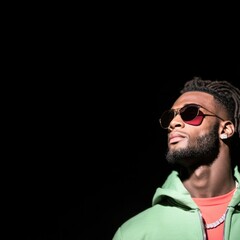 Obraz premium Stylish Young Man in Urban Hip Hop Fashion Portrait