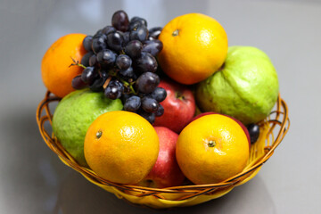 Close up of Fresh organic fruits in basket.