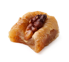 Traditional dessert featuring nut filling served on a plate during a festive gathering