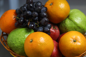 Close up of Fresh organic fruits in basket.