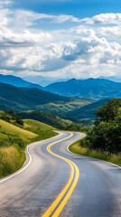 Naklejka premium Winding mountain road, scenic drive, summer landscape, blue sky, clouds