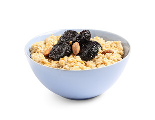 Bowl of tasty oatmeal with prunes and almonds on white background